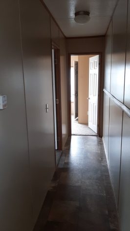 Hallway to other bedrooms and bathroom